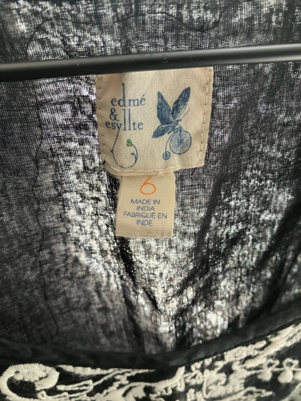 NWOT Anthropologie Black Top with White Floral Embroidery